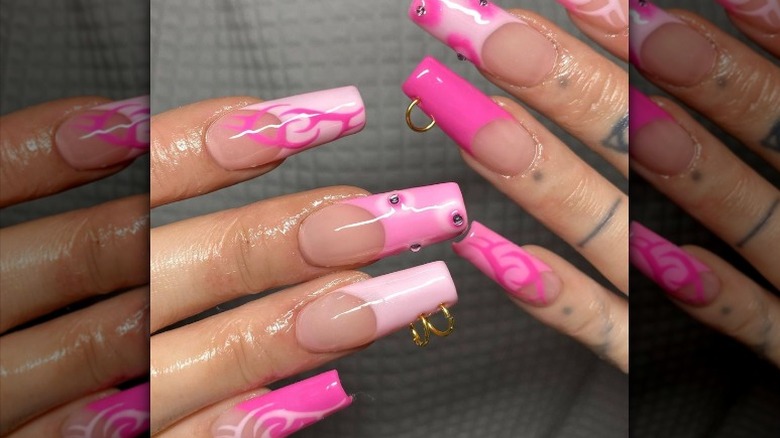 pink nails with piercings 