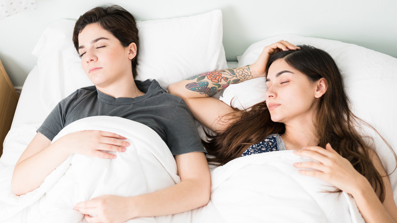 lesbian couple in bed