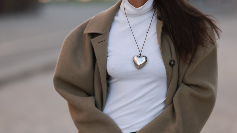 woman with heart necklace