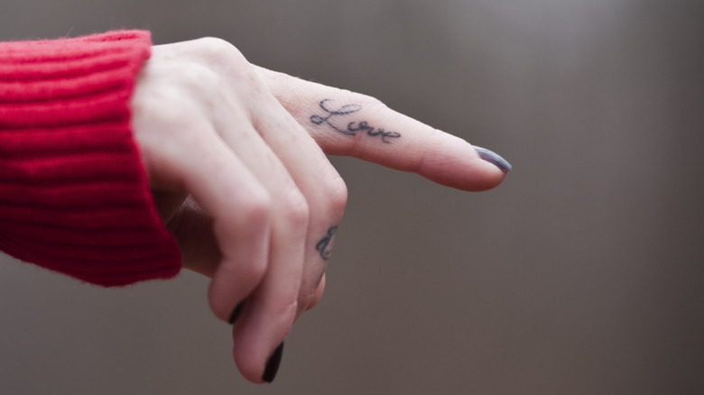 hand with tattoos
