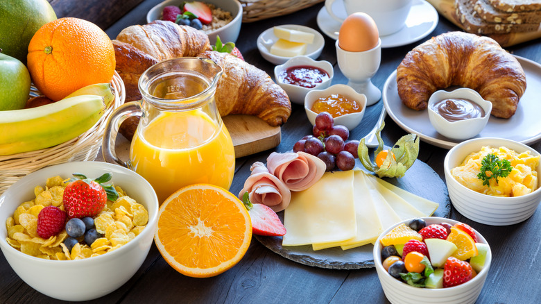 Various breakfast foods on table
