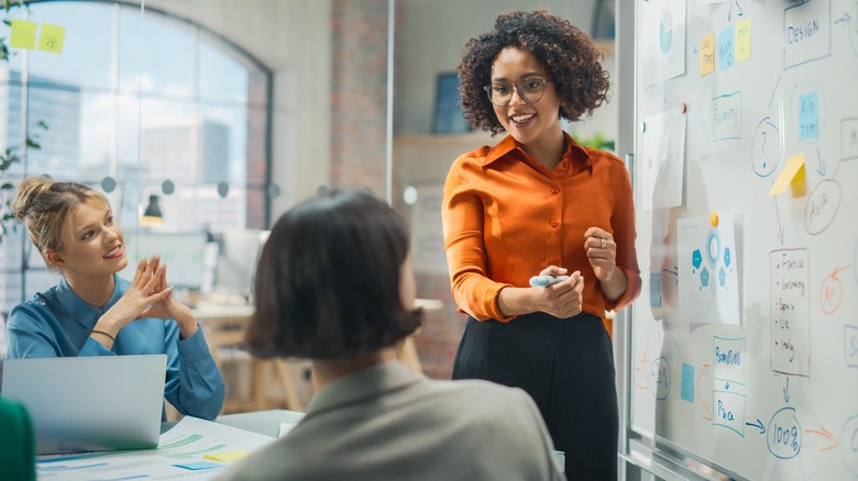 woman leading work meeting