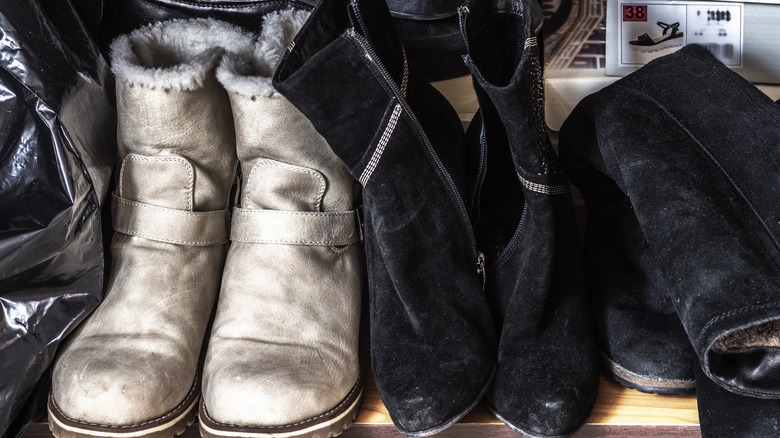 Boots stored in a closet