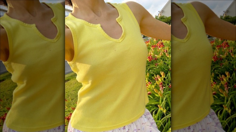 Woman wearing yellow ribbed tank