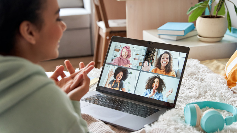 woman video chatting with friends