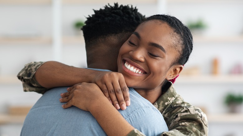 Two people hugging