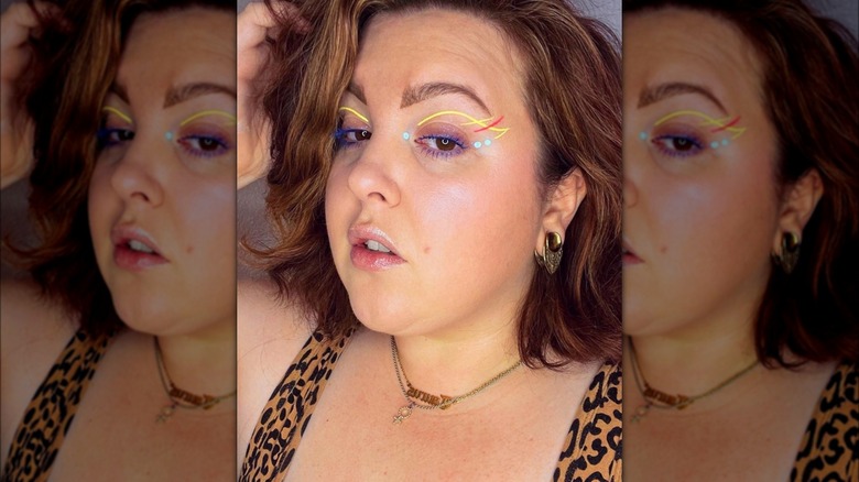 Abstract yellow and red eyeliner