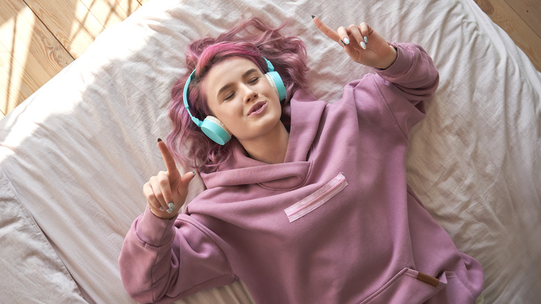 teenager listening to music