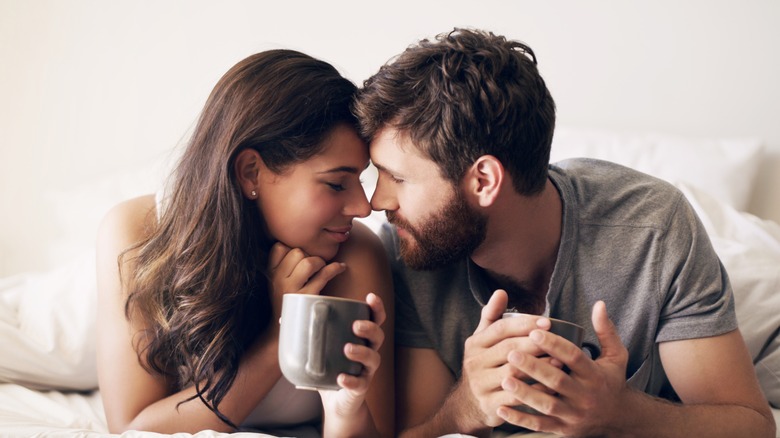 couple having coffee in bed