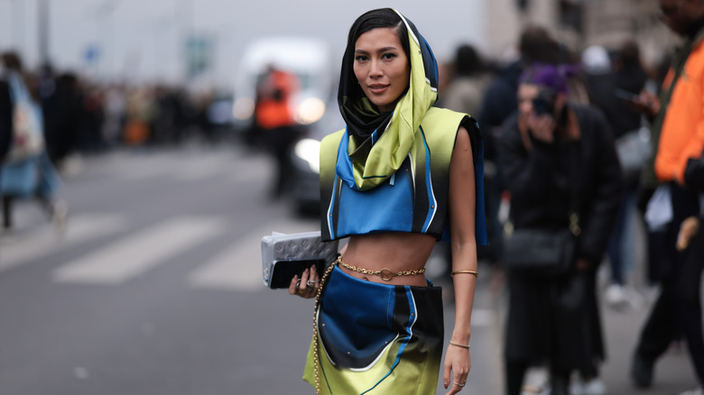 woman wearing chain belt 