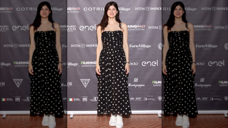 Alexandra Daddario in a black dress