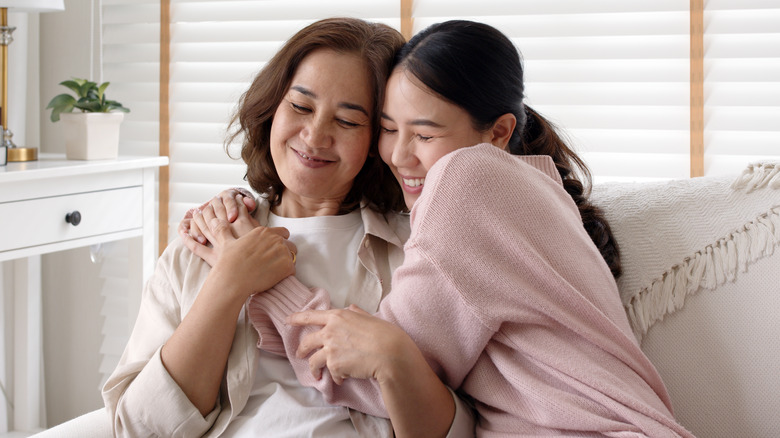 Two women hugging