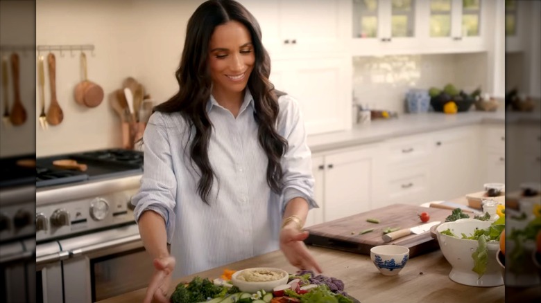 Meghan Markle wearing a button-up shirt on "With Love, Meghan."