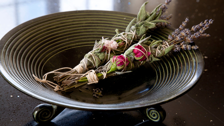 Sage and lavender sticks in a bowl.
