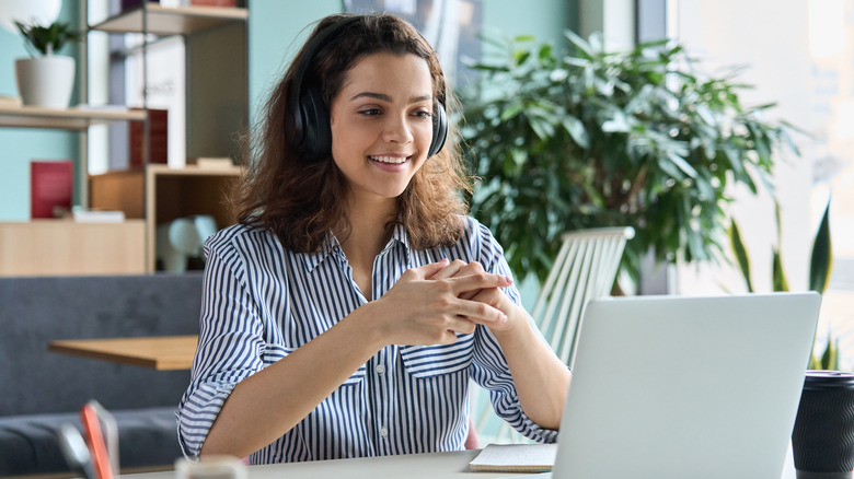 Young woman taking an online course 