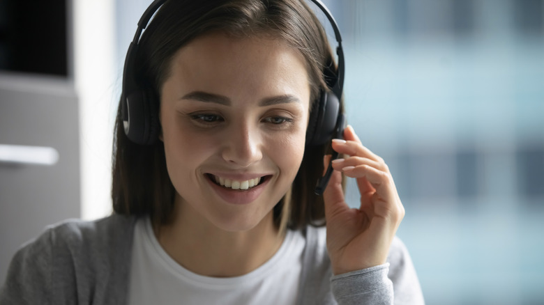 Woman with headset talking on the phone 