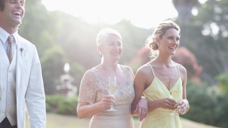 Wedding guests holding champagne