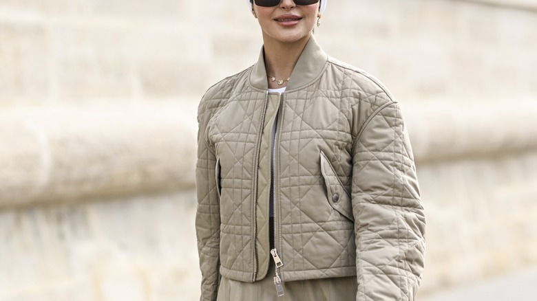 woman wearing quilted jacket