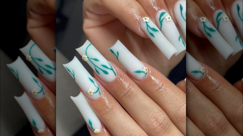 white and green floral nails