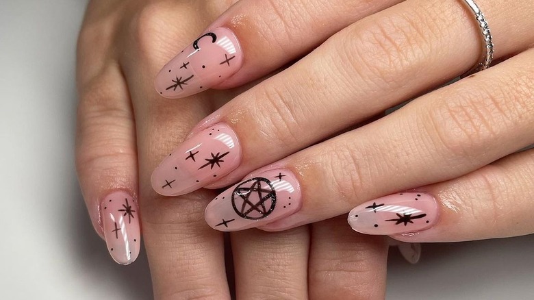 witch imagery halloween nails