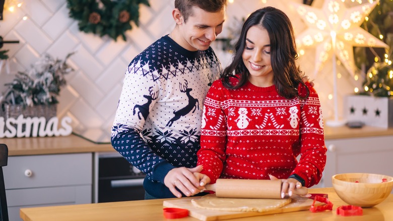 couple baking cookies