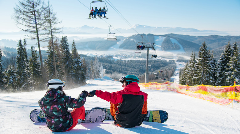 snowboarding couple