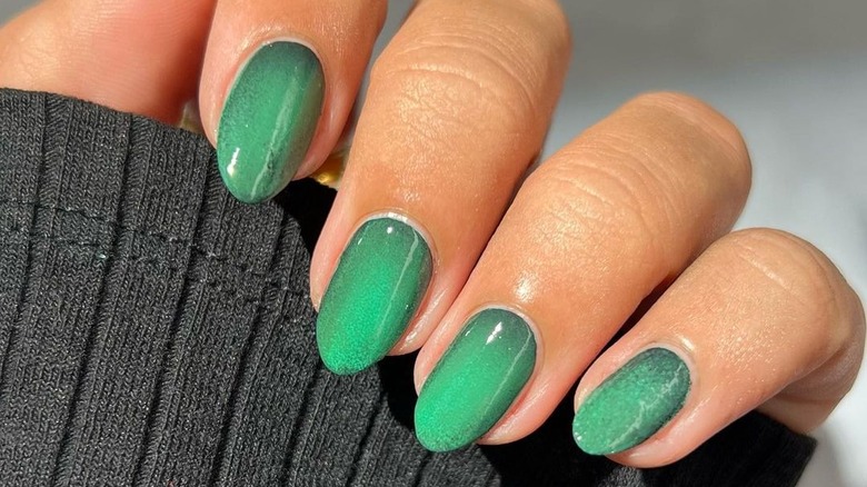 Green aura nail art