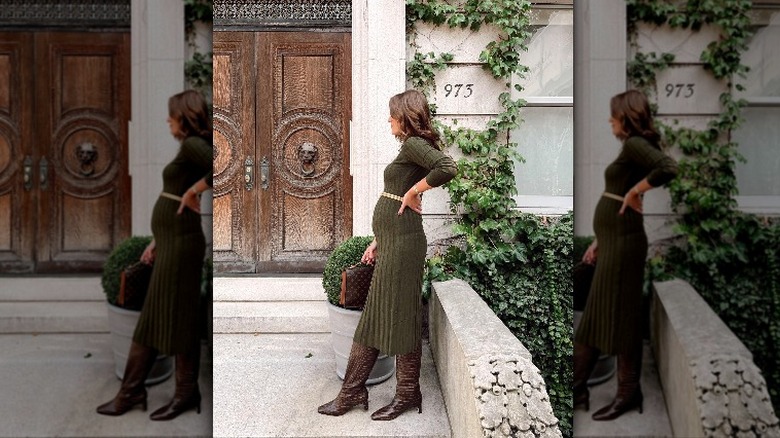 woman standing on step wearing midi knit dress