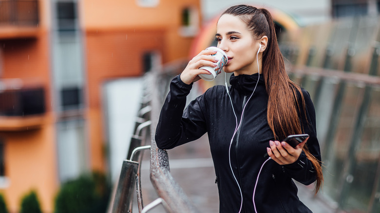 woman sipping coffee