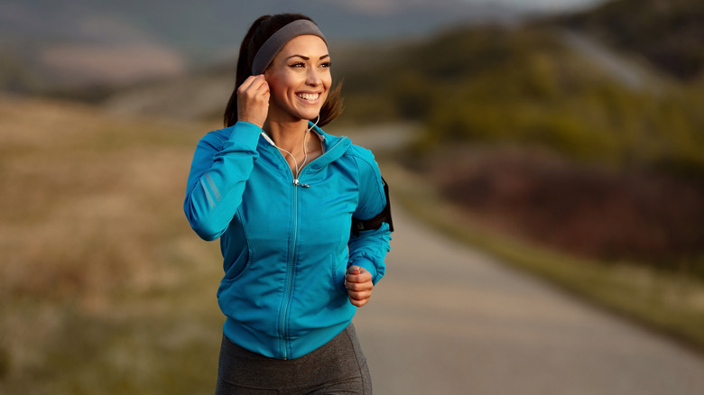 woman listening to music on headphones