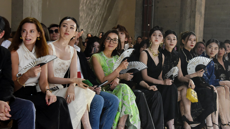 Fashion show guests front row