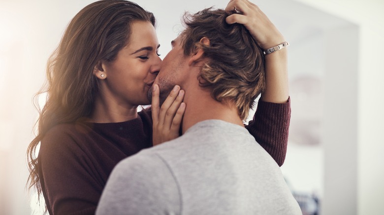 Man and woman kissing