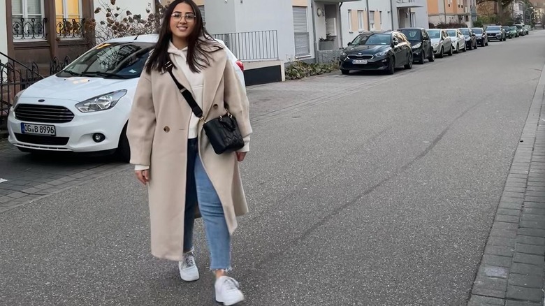 Woman walking and smiling