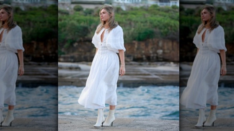 woman wearing a white maxi dress