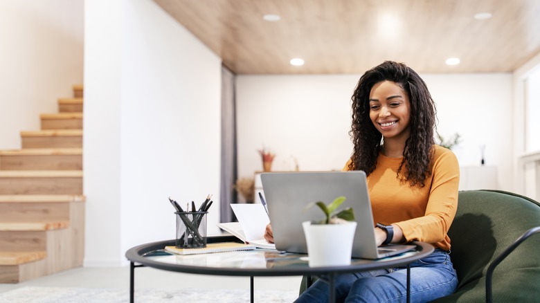 Woman researching at computer