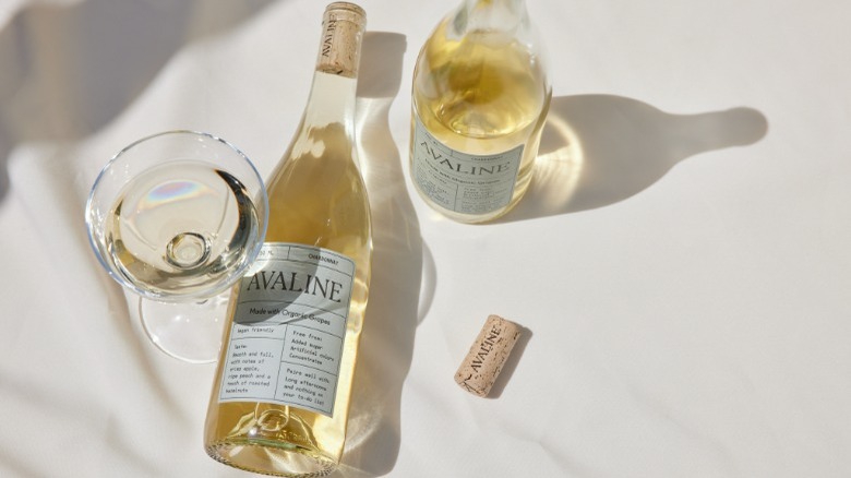 Avaline white wine bottle with glass and cork