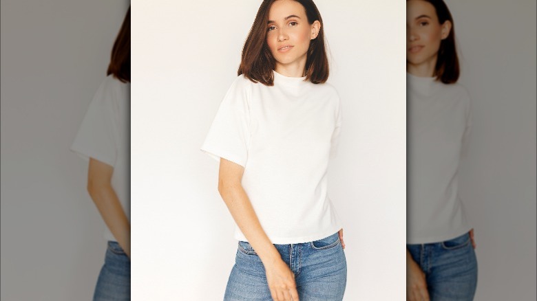 Woman wearing white t-shirt and jeans 