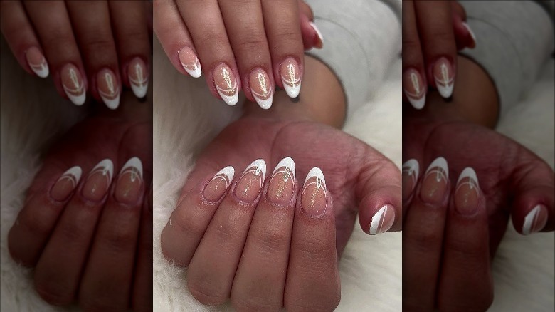 Woman wearing french tip angel nails