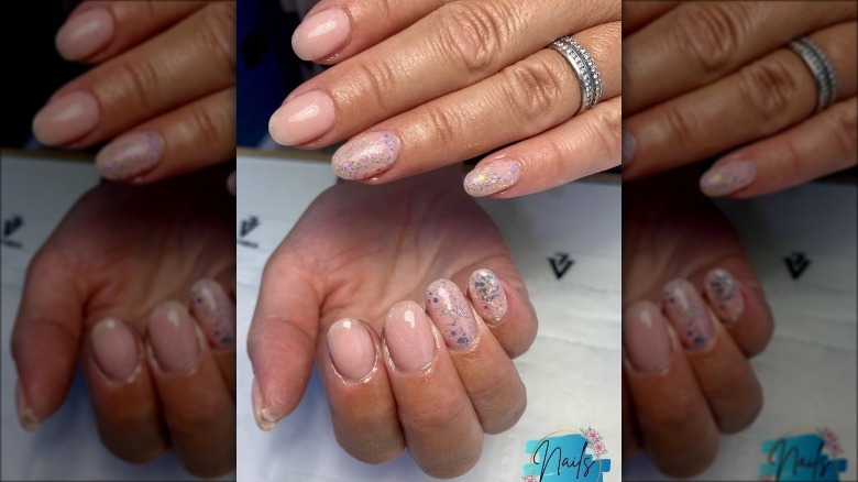 Woman wearing glitter on her nails