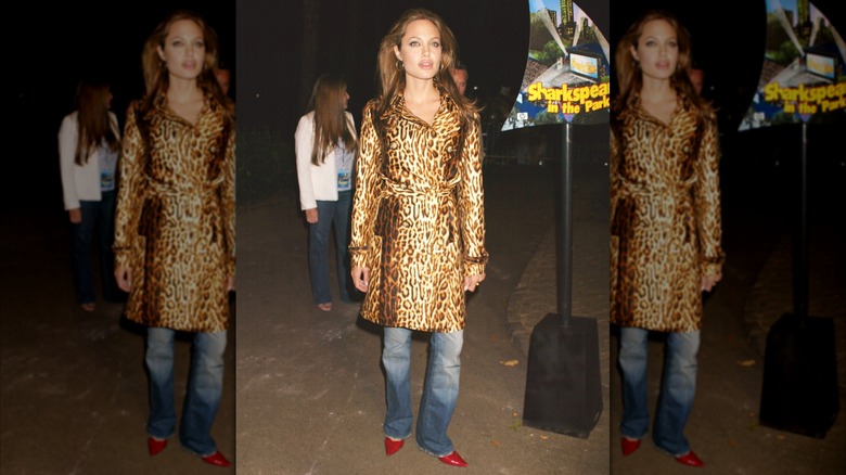 Angelina Jolie wearing a leopard-print trench coat.