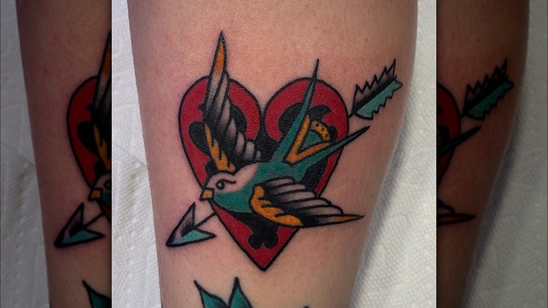 American traditional sparrow tattoo on ankle