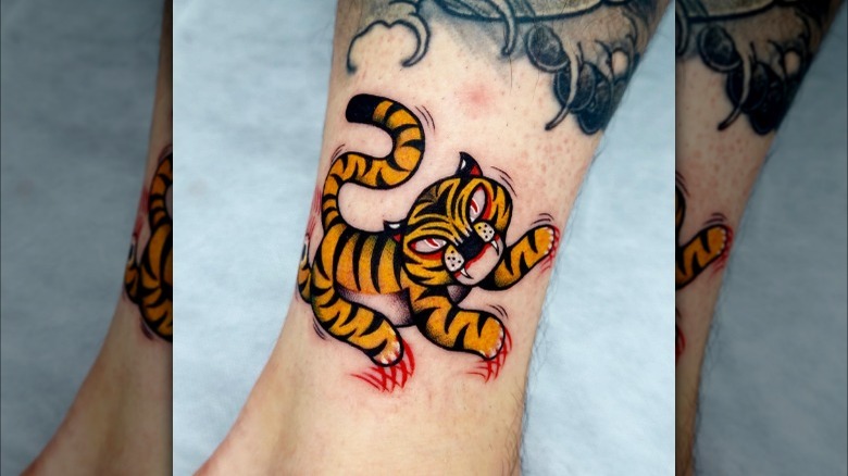 Bright orange tiger tattoo