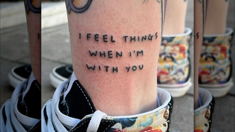 Lettering tattoo on ankle