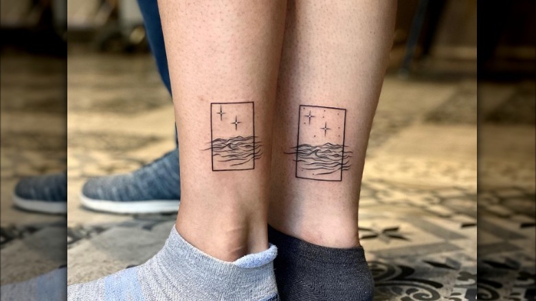 Matching ocean tattoos on ankles