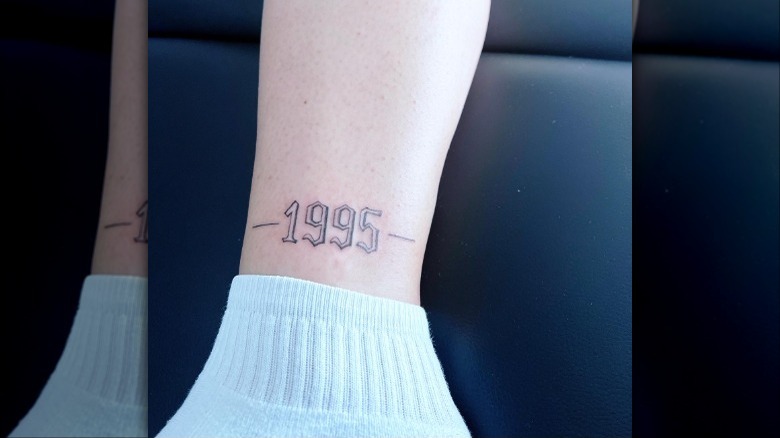 1995 date tattoo on ankle