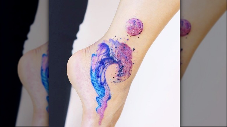 Watercolor moon and wave tattoo