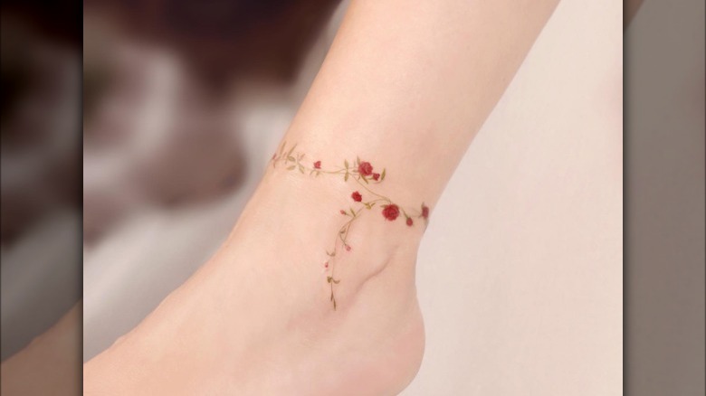 Floral tattoo around ankle