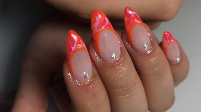 neon orange and white tip manicure