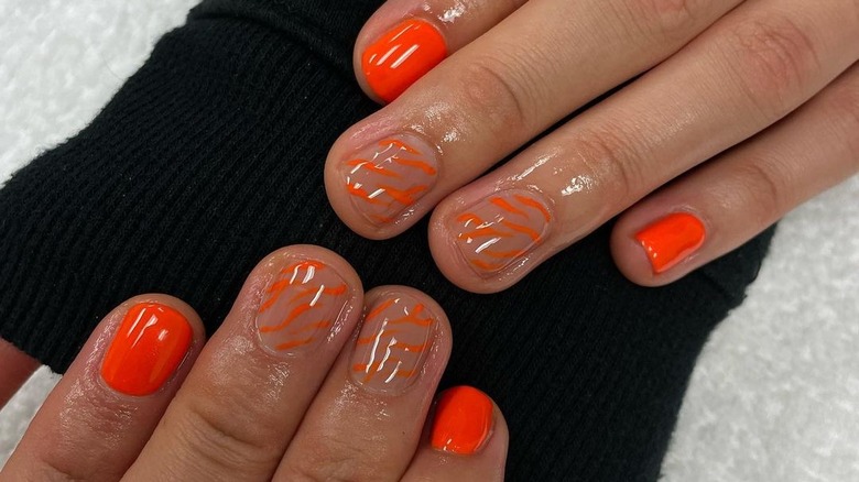 neon orange zebra stripe nails