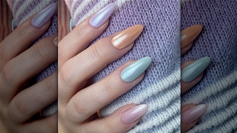 Person showing pastel chrome manicure